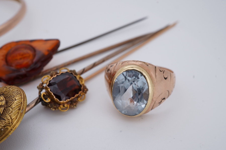 A collection of stick pins, bangle and ring, comprising: a 9ct gold and seed pearl bangle centring on a horseshoe motif, British hallmarks, gross weight 5 grams; a 9ct gold wide band ring, British hallmarks, gross weight